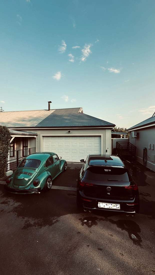 Classic Volkswagen Beetle and Golf R detailed at sunset by Washr